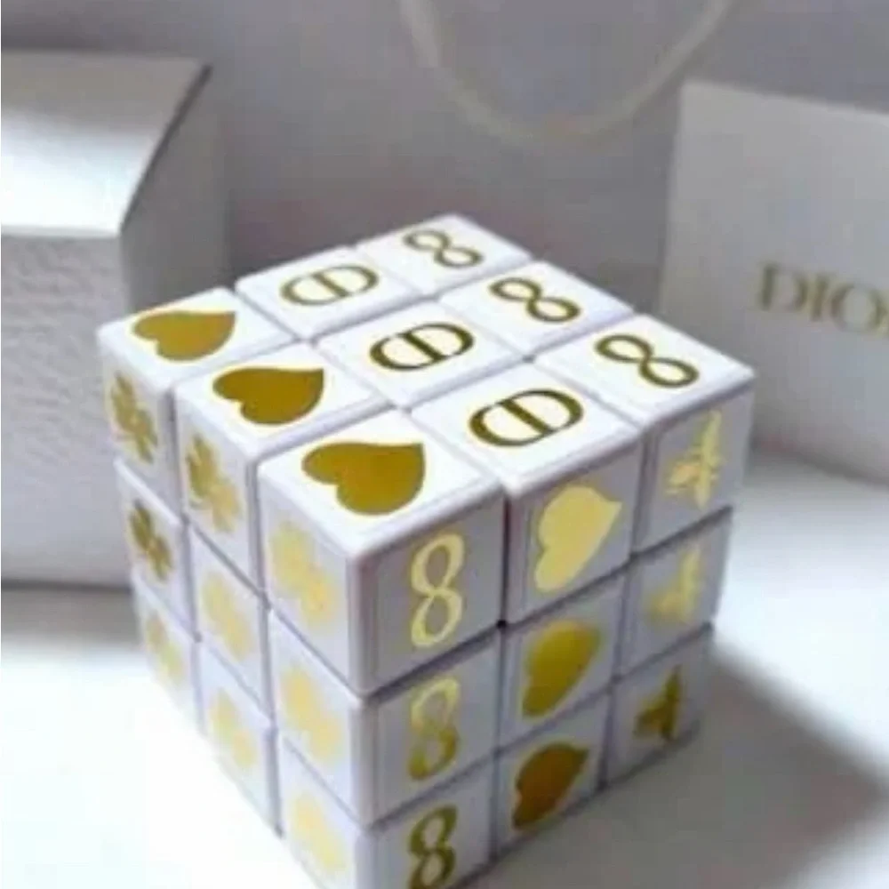 Dior White Rubik’s Cube Puzzle with Gold Emblems - Picture 1 of 2